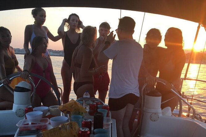 sunset-boat-trip-with-open-bar-of-cava-local-champagne