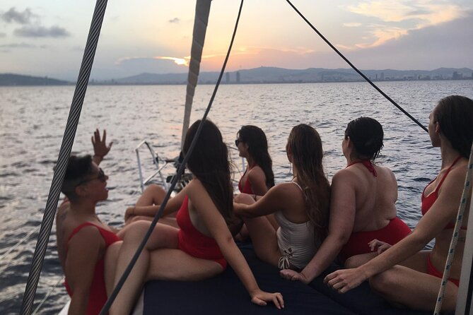 sunset-boat-trip-with-open-bar-of-cava-local-champagne