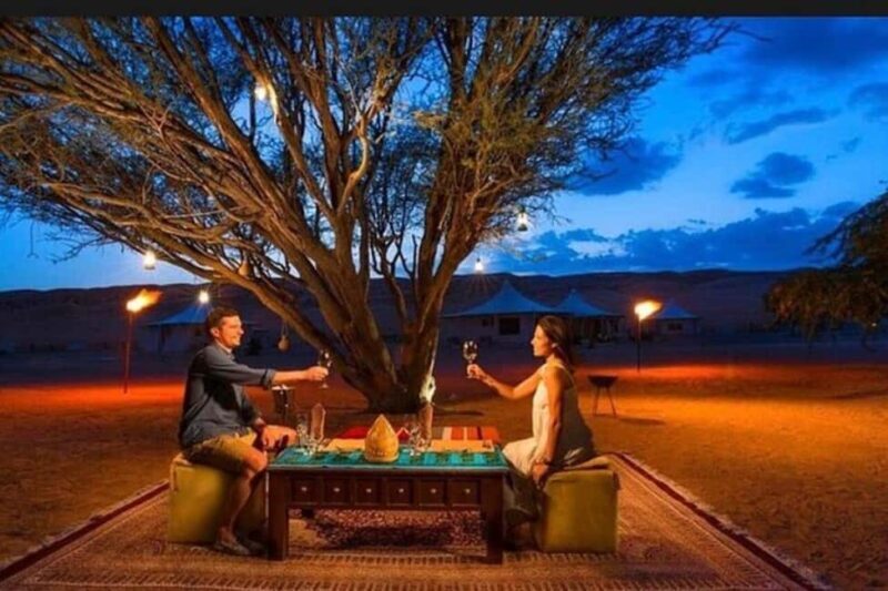 Sunset &camel ride and luxury dinner with fire show - Authentic Experiences and Highlights