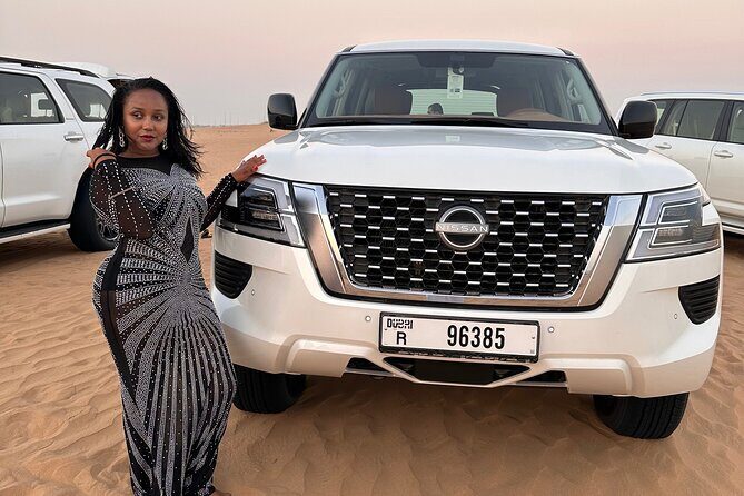 Sunset Desert safari with Camel Ride Sand Board & BBQ Dinner - An Authentic and Fun Desert Experience in Dubai