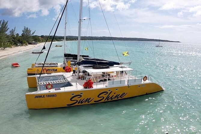 sunset-party-cruise-ricks-cafe-ocean-coral-eden-bay-guests