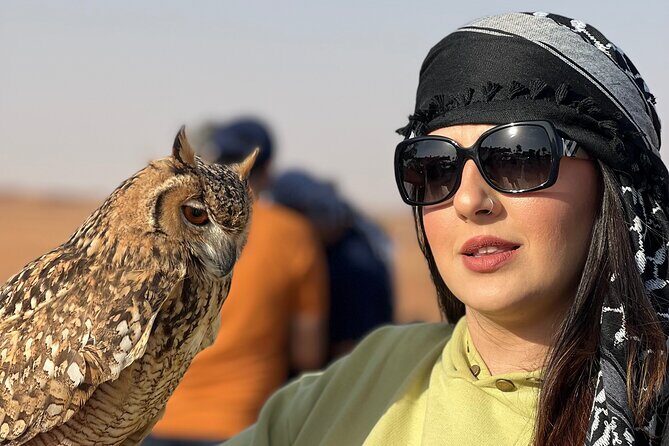 Sunset Safari with BBQ Dune Drive Camel Ride & Dune Buggy option - Camel Ride and Falcon Encounter