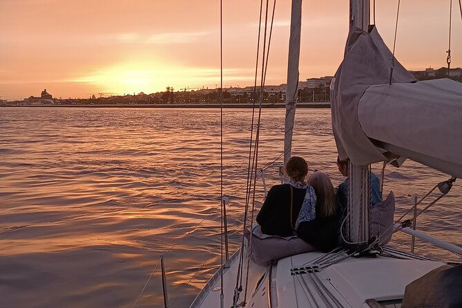 sunset-sailing-boat-trip-in-lisbon-with-snacks