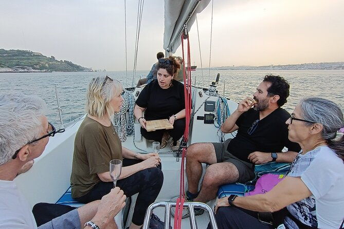 sunset-sailing-boat-trip-in-lisbon-with-snacks