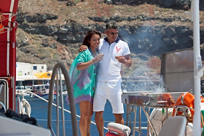 sunset-sailing-catamaran-cruise-in-santorini-with-bbq-and-drinks