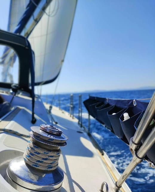 sunset-sailing-trip-along-alghero-coastline-with-aperitif