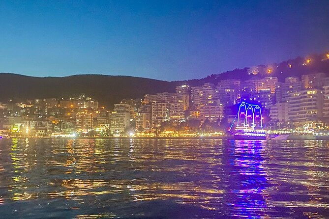 sunset-saranda-and-night-city-glow-kayak-or-sup-tour