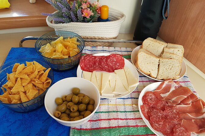 sunset-yacht-ride-in-barcelona-snacks-and-drinks