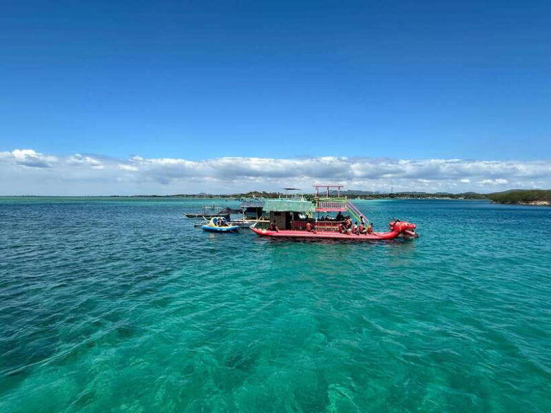swimming-in-little-boracay-beach-w-floating-bamboo-cottage