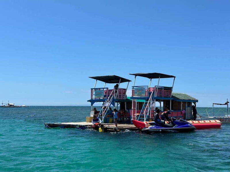 swimming-in-little-boracay-beach-w-floating-bamboo-cottage