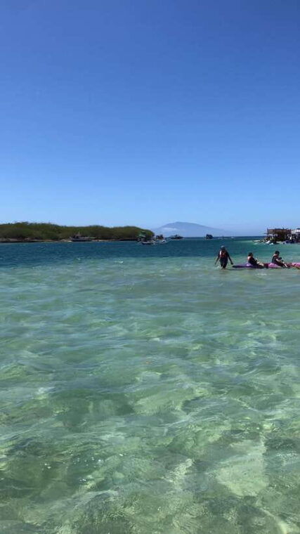 swimming-in-little-boracay-beach-w-floating-bamboo-cottage