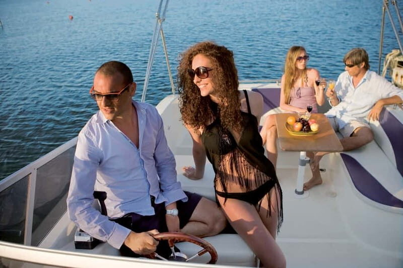 Taormina: Dolphin Search with Sunset Aperitif in Group Boat - Key Points
