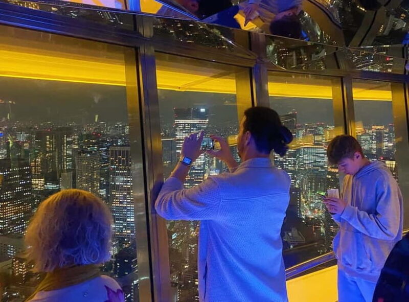 Tokyo : Night E-Bike Tour with Tokyo Tower and Dolphin Show - Maxwell Aqua Park and the Night Dolphin Show