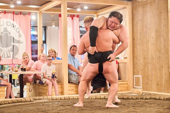 TokyoSumoShow, ChickenHotPot, and Mochi-Pounding by Pro Wrestlers - Key Points