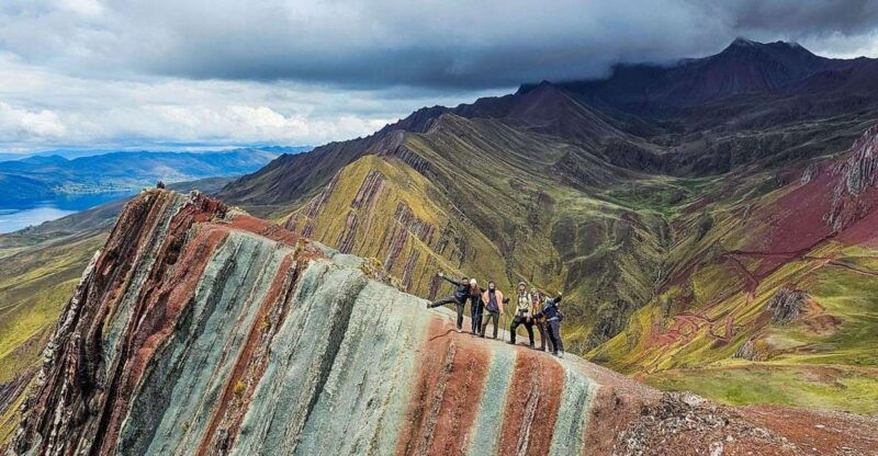 tour-cusco-pallay-poncho-of-apu-tacllo