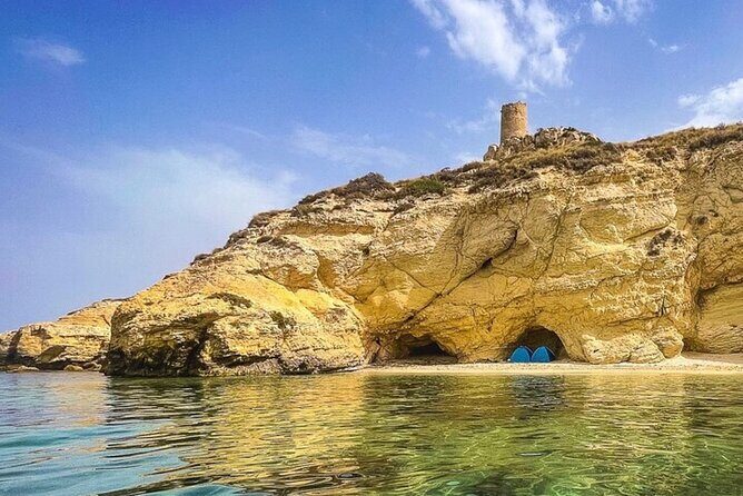 Tour La Dolce Vita stops for swimming, Snorkeling and Prosecco - A Closer Look at the La Dolce Vita Boat Tour in Cagliari