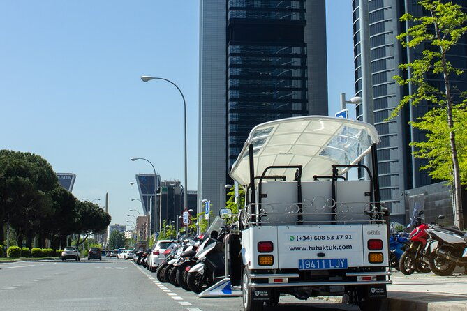 tour-of-historic-and-modern-madrid-with-a-guide-in-a-yellow-tuk-tuk