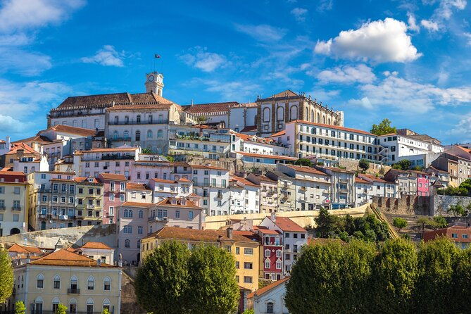 transfer-tour-lisbon-porto-with-2-stops-options-obidos-nazare-fatima-coimbra