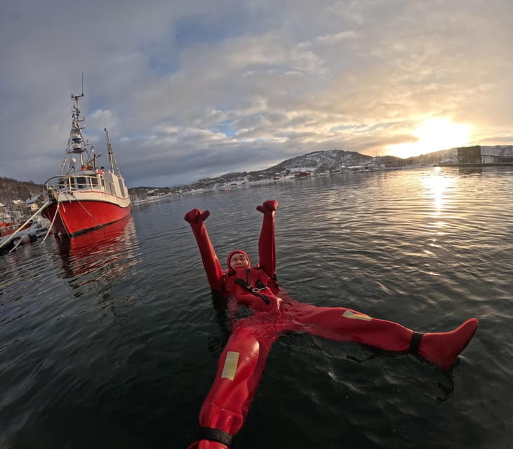 tromso-arctic-fjord-floating-in-survival-suit