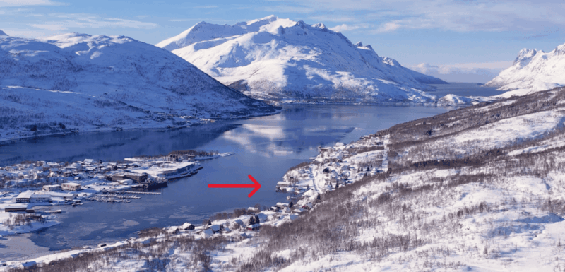 tromso-arctic-fjord-floating-in-survival-suit