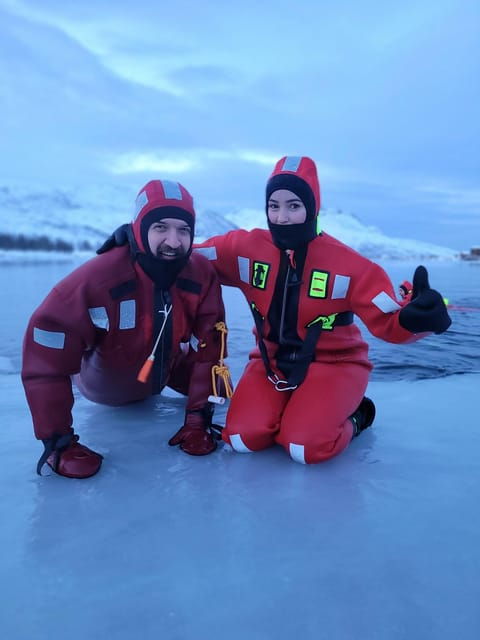 tromso-arctic-fjord-floating-in-survival-suit