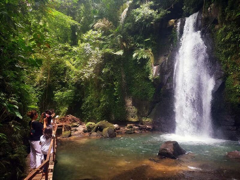 Ubud: Zipline, Waterfall & Tirta Empul Holy Temple Day Tour - Key Points