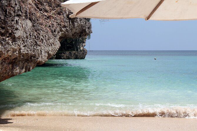 Uluwatu Temple, Kecak Dance, Padang-padang & Suluban Beach Tour - The Sum Up