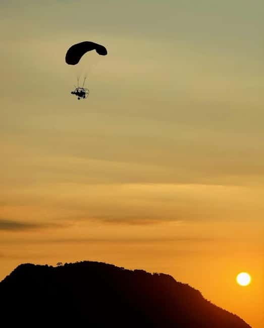 Vang Vieng Day Tour - Longtail boat, Paragliding - Combining Longtail Boat and Paragliding