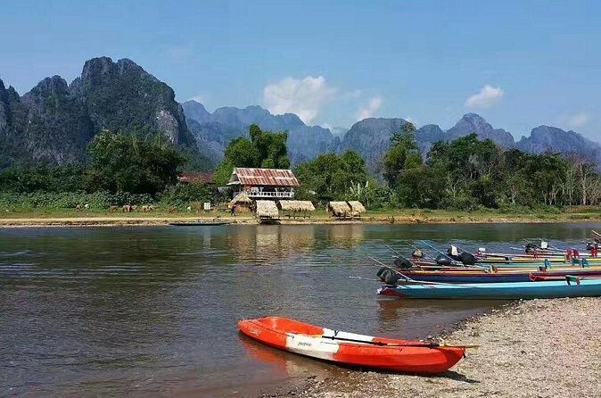 Vang vieng Shared Tour:Longtail boat,Hot Air Balloon,pick-up - Authenticity and the Guide Experience