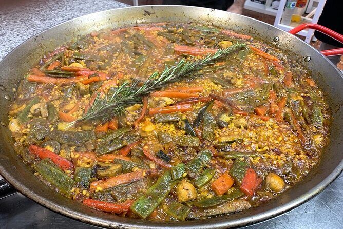 Vegetable Paella cooking class, tapas and Ruzafa market visit - The Sum Up