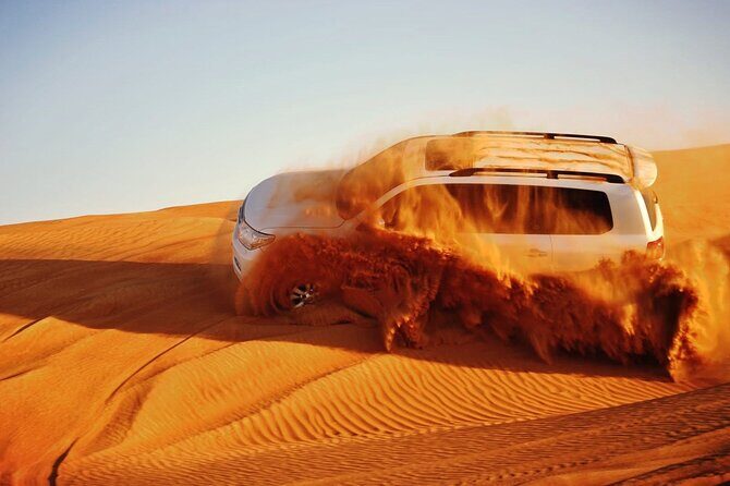 Vip Evening Desert Safari with quad bike,Camel Riding & Dinner - Key Points