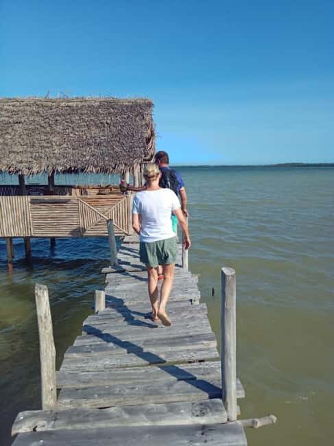 Watamu: Sunset Mangrove Canoe Tour with Coconut Drink - Sunset Magic and Village Life