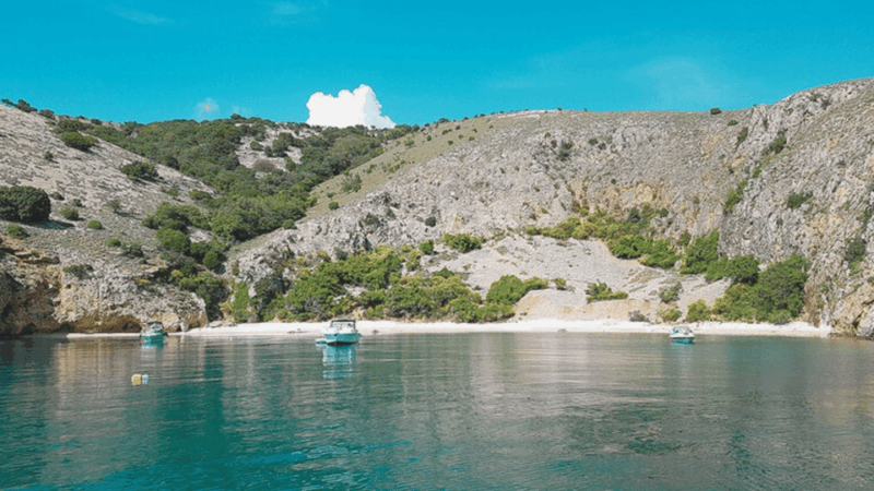 wild-bays-of-krk-sunset-swimming-with-a-pirate-ship