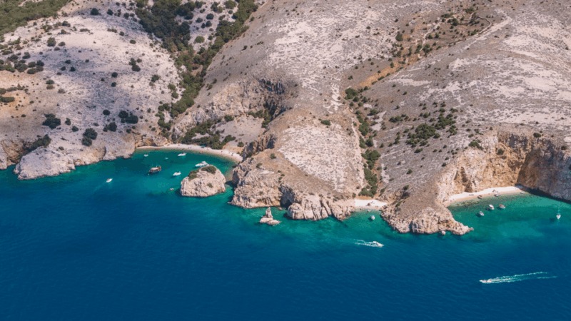 wild-bays-of-krk-sunset-swimming-with-a-pirate-ship