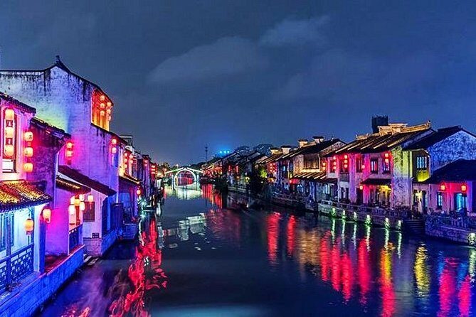 Wuxi Private Night Tour with Boat Cruise and Authentical Dinner - Key Points