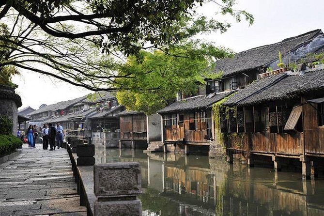 Wuzhen and Xitang Water Town Amazing Private Day Tour from Hangzhou - Journey Through the Day: What To Expect