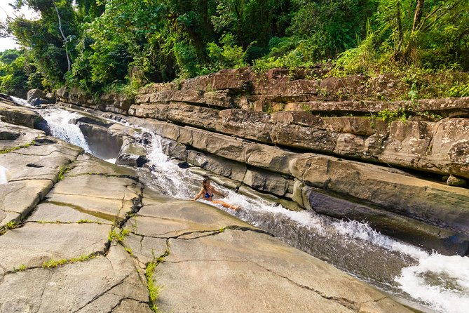 yunque-rainforest-river-rope-swing-with-waterslide-and-beach-tour