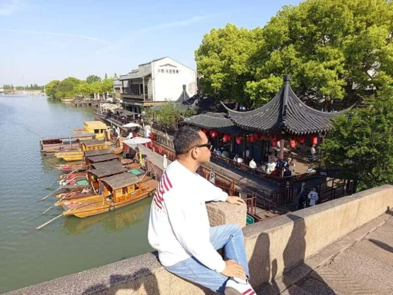 Zhujiajiao Water Town and Shanghai Fake Market Shopping Tour - Key Points