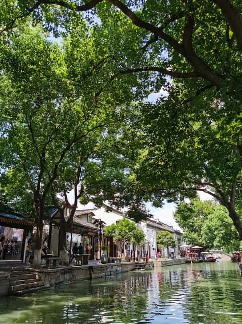 Zhujiajiao Water Town & Shanghai Highlights Day Tour - Key Points